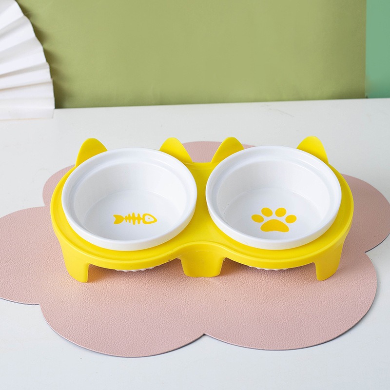 Ceramic overhead cat bowl with metal stand to protect spine