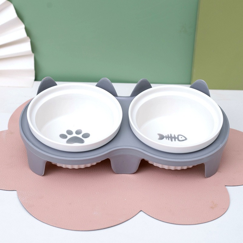 Ceramic overhead cat bowl with metal stand to protect spine