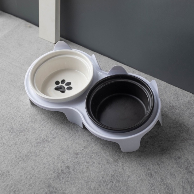 Ceramic overhead cat bowl with metal stand to protect spine